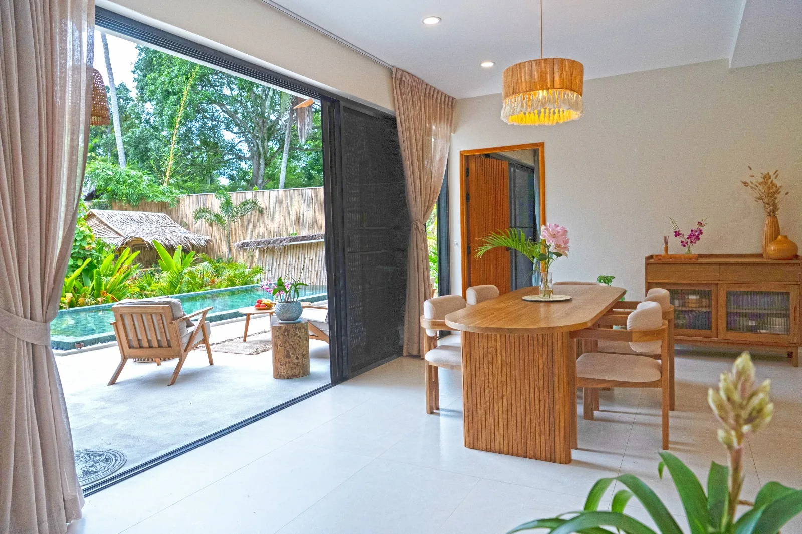 Central Villa exterior with private pool and tropical plants
