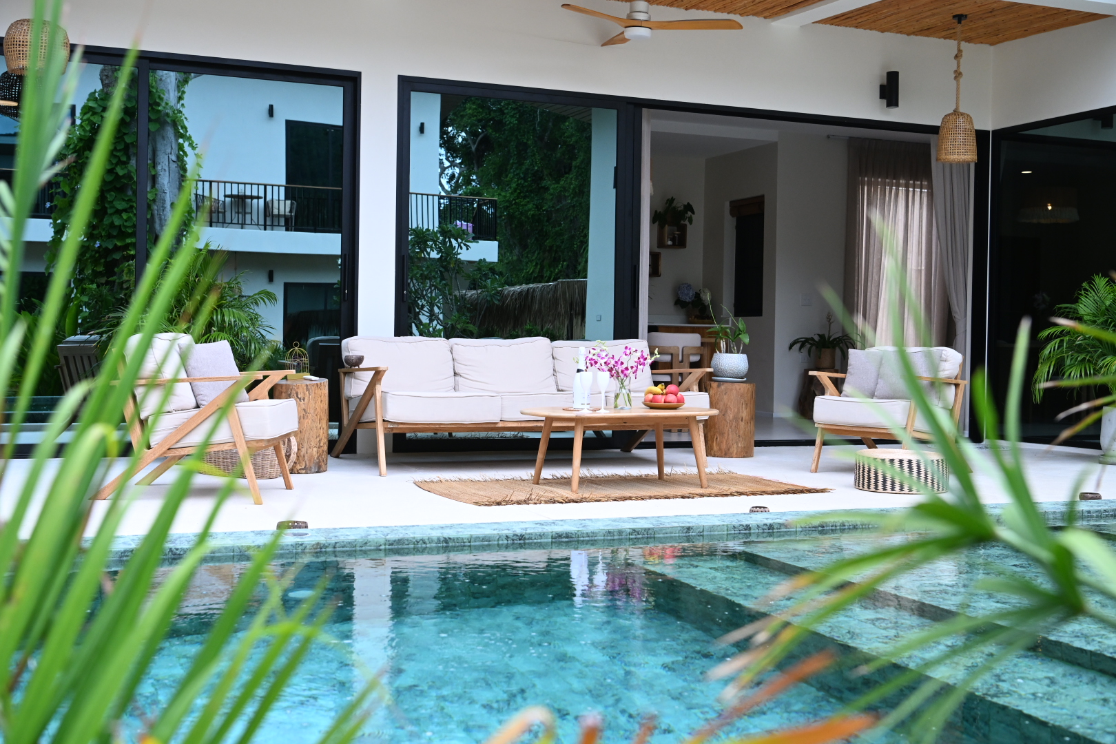 Central Villa pool beside the furnished covered terrace