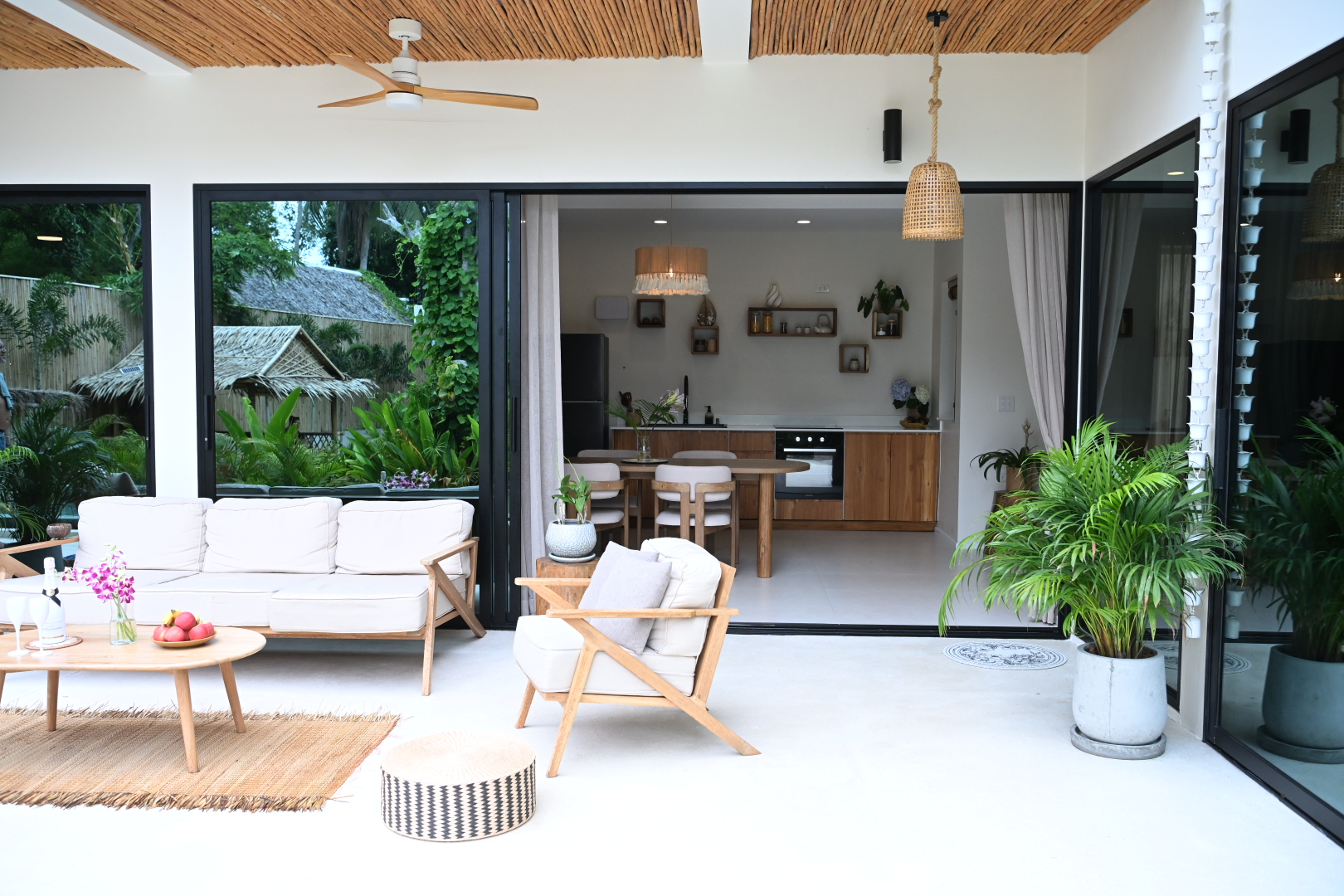 Central Villa terrace opening into the modern kitchen